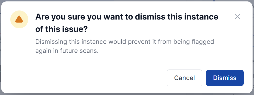 Confirmation dialog reading "Are you sure you want to dismiss this instance of this issue? Dismissing this instance would prevent it from being flagged again in future scans." with Cancel and Dismiss buttons.